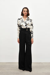 Pantalon large taille haute à boutons dorés