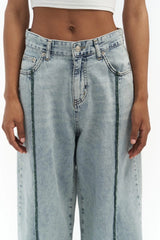 Jean large à rayures latérales