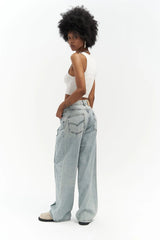 Jean large à rayures latérales