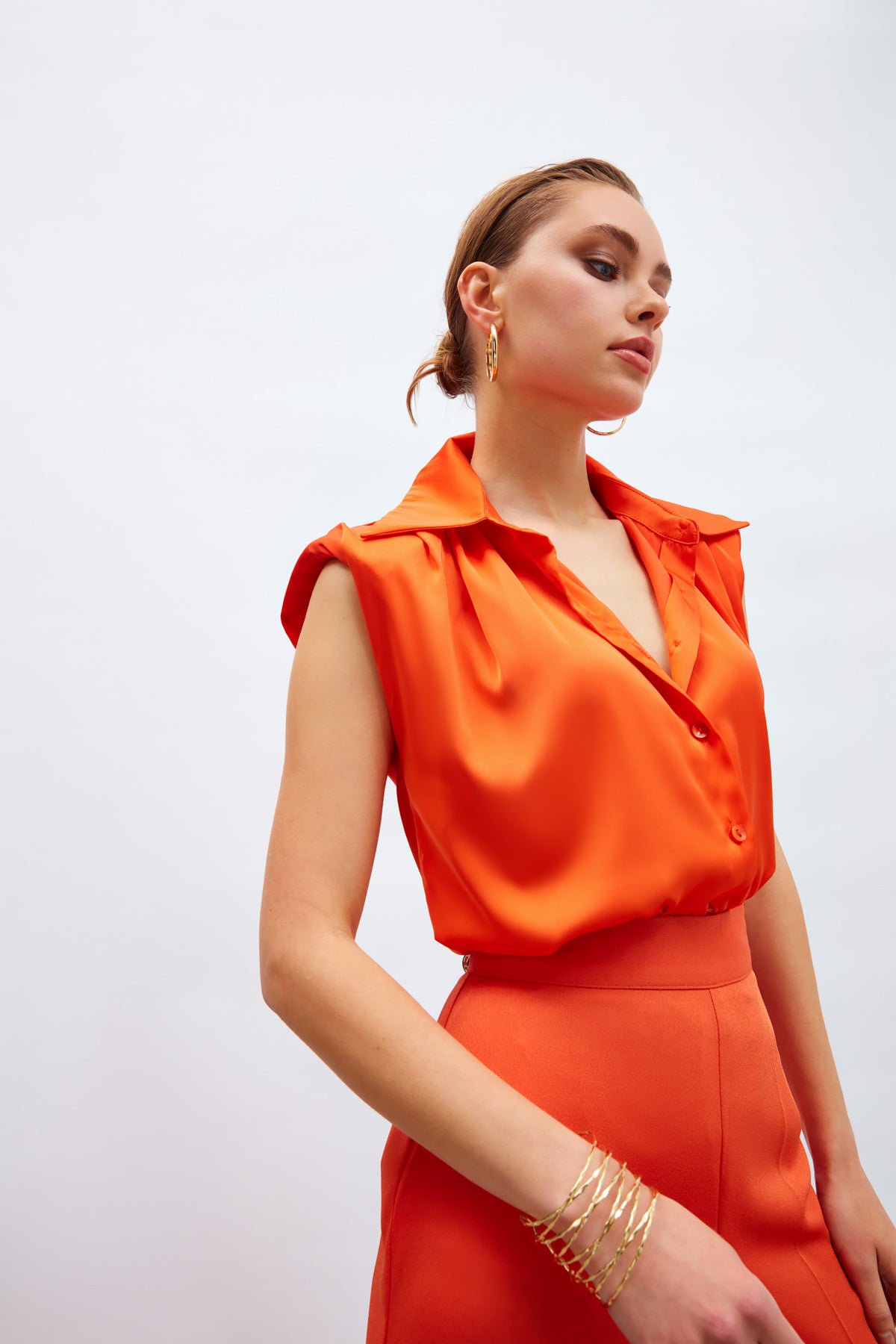 Haut boutonné sans manches