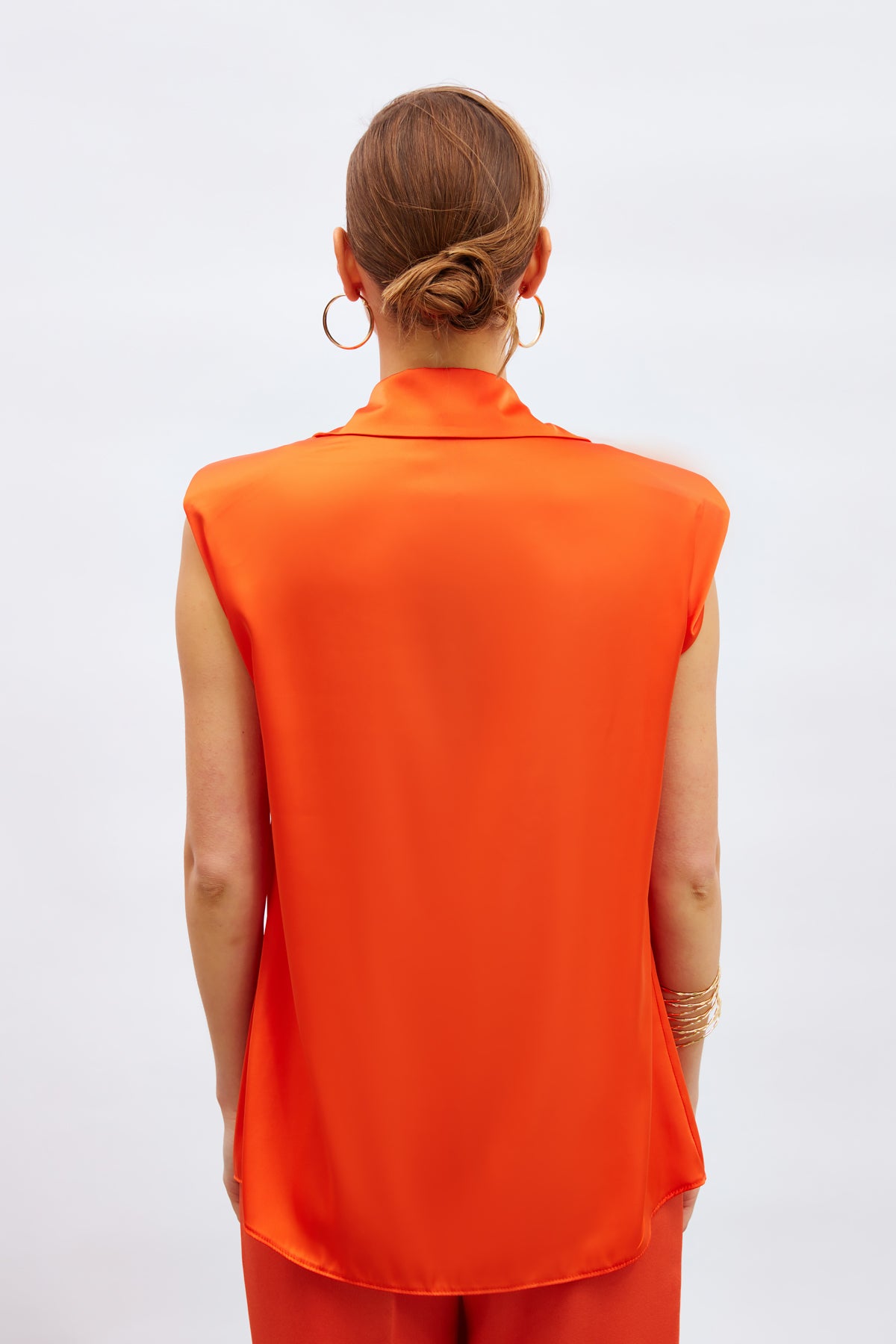 Haut boutonné sans manches