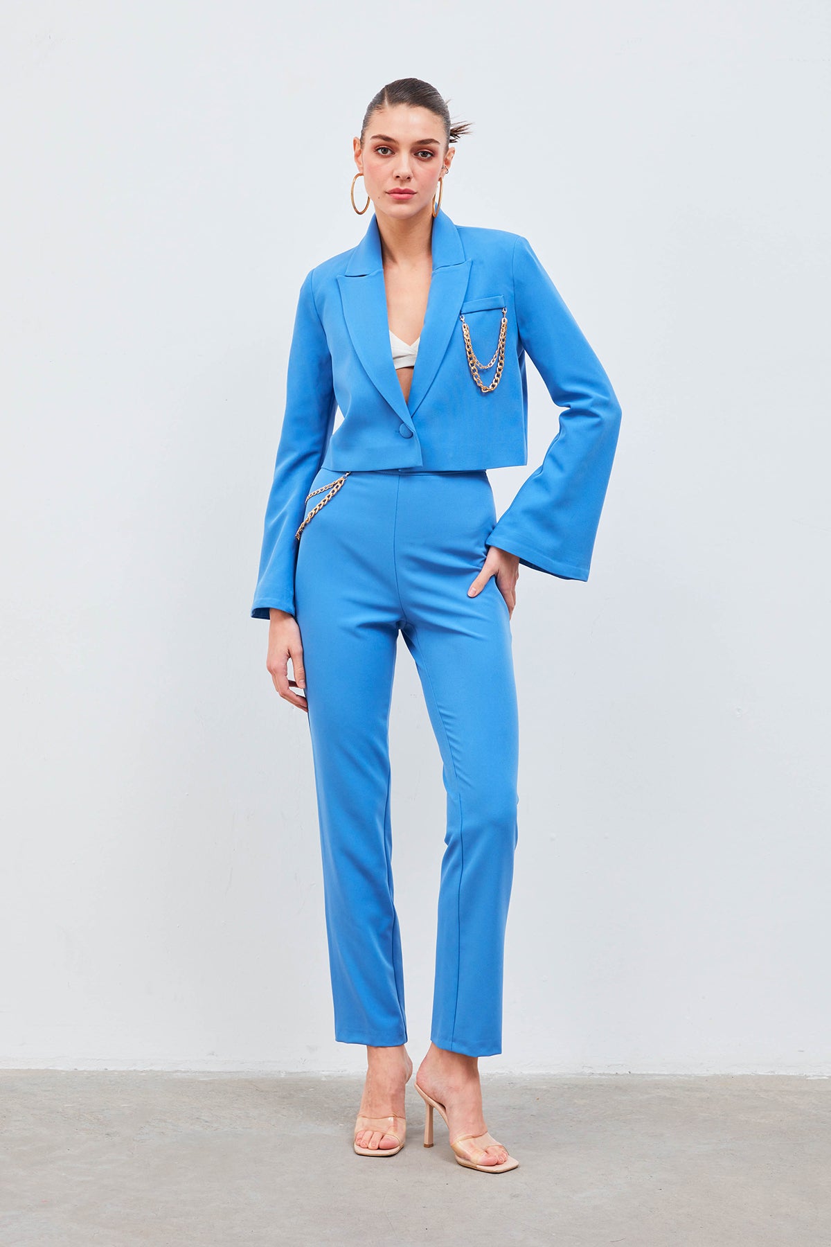 Pantalon slim avec chaîne latérale